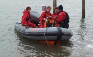 Get behind the wheel of our fast Power Boat